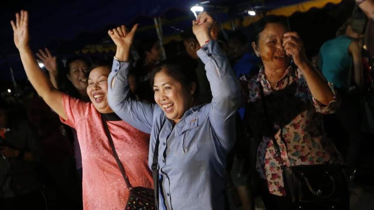 Onlookers celebrate in Chiang Rai.