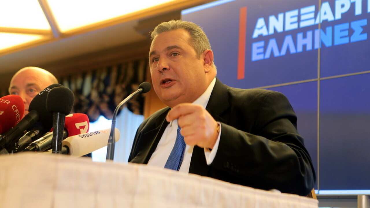 Greek Defence Minister and leader of the Independent Greeks party Panos Kammenos addresses the media after a meeting with Greek Prime Minister