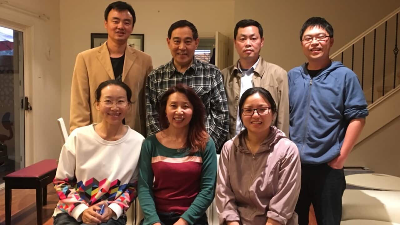 Professor Jianguang Qin and his research team at a lab of Flinders University (second from left back row)