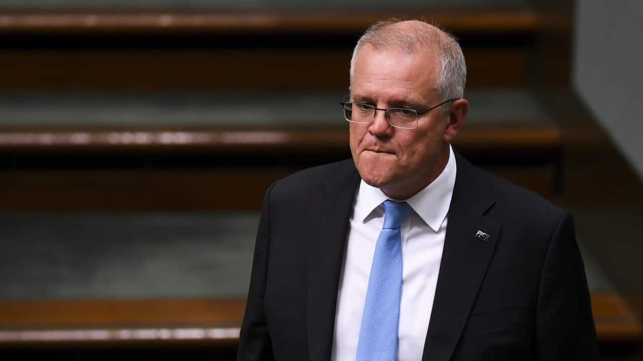 Australian Prime Minister Scott Morrison reacts during House of Representatives Question Time at Parliament House in Canberra, Tuesday, March 16, 2021. (AAP Image/Lukas Coch) NO ARCHIVING