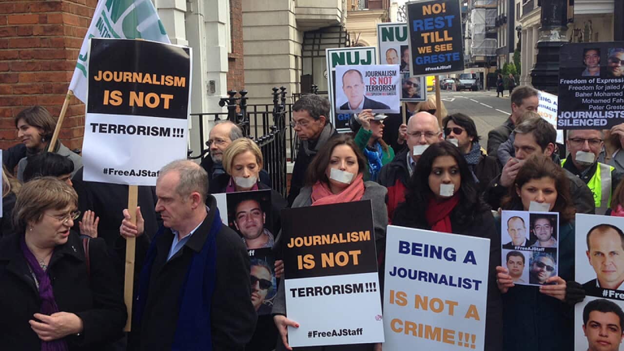 Journalists demonstrate outside the Egyptian embassy in London