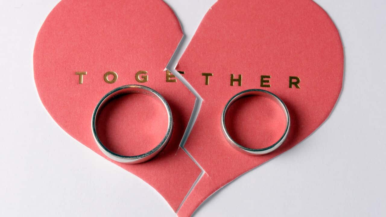 A pair of Wedding rings pictured on a broken love heart, London. Picture date: Thursday August 28, 2014. . Photo credit should read: Anthony Devlin/PA Wire