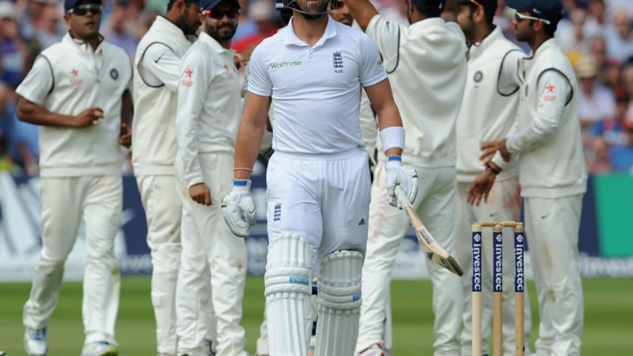 England's Matt Prior walks back to the pavilion after being bowled