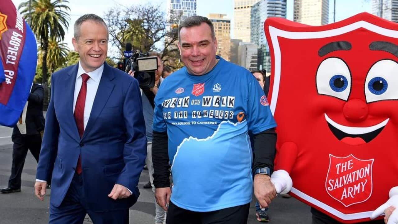 Salvation Army Major Brendan Nottle (C)