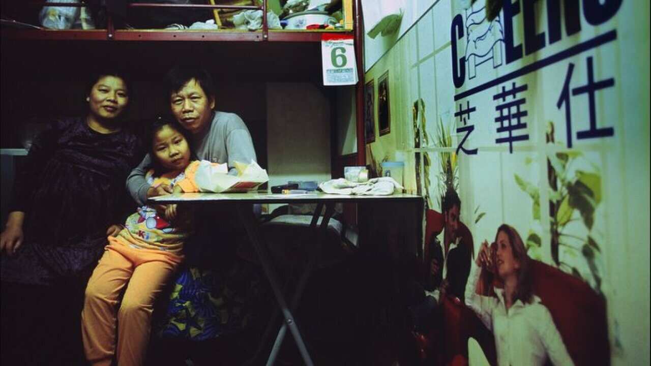 Cage people, or the issue of precariousness in Hong Kong city, Hong Kong in March, 2006-