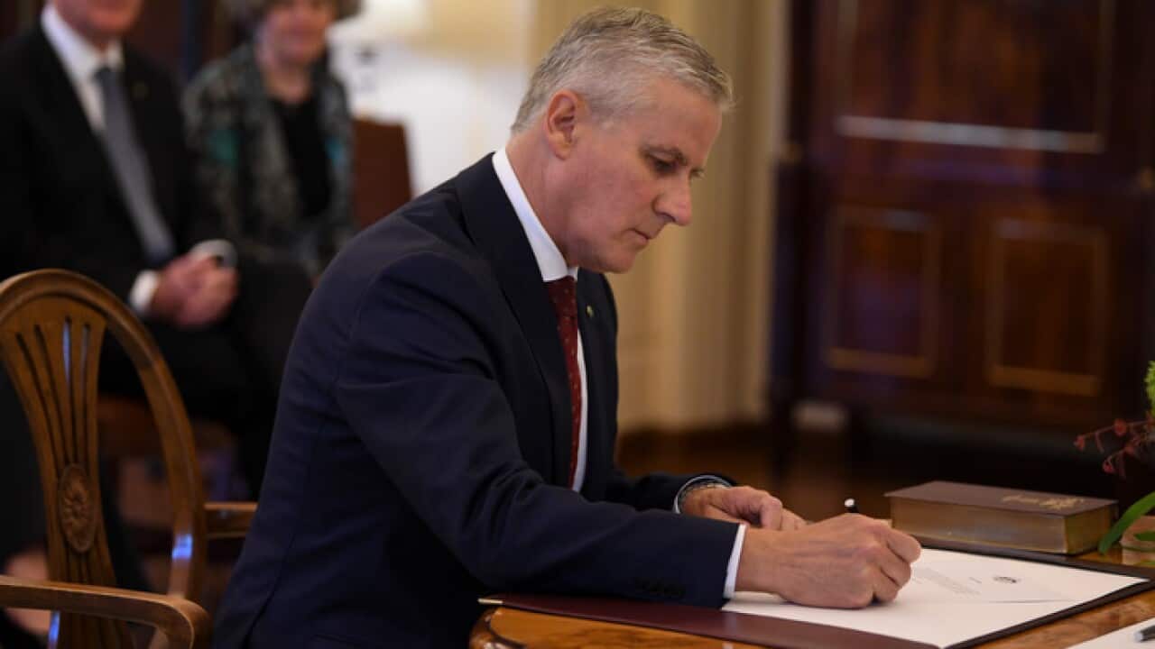 Newly-elected Nationals party leader Michael McCormack is sworn-in as Australia's Deputy Prime Minister during a ceremony at Government House in Canberra, Monday, February 26, 2018. (AAP Image/Lukas Coch) NO ARCHIVING