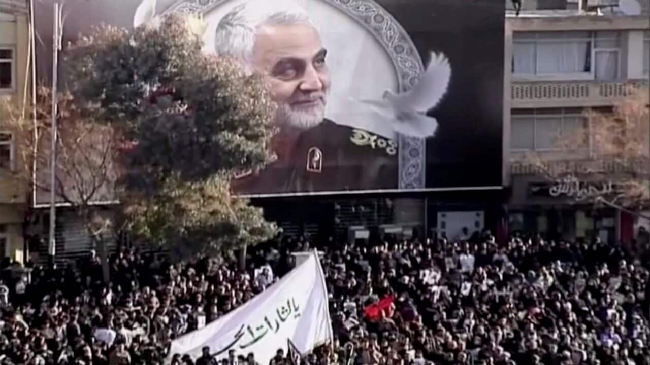 Mourners gather to pay their respects to the slain Soleimani in his hometown.