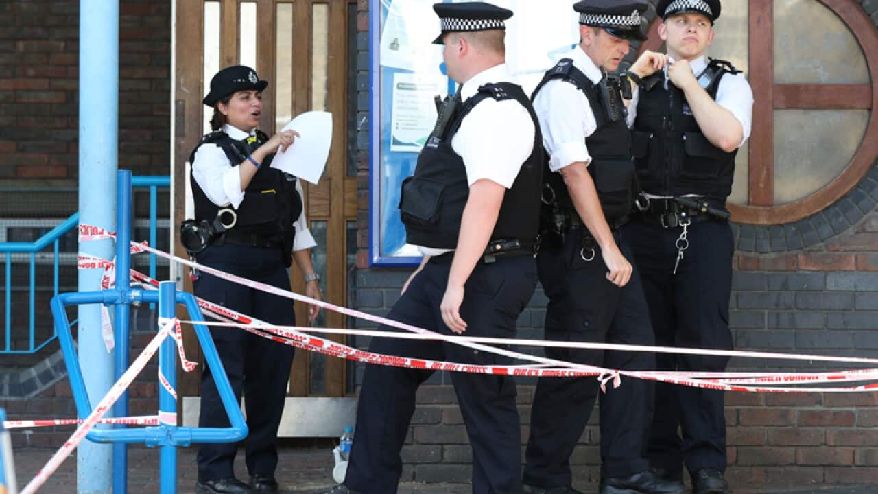 Police officers at Grenfell Tower