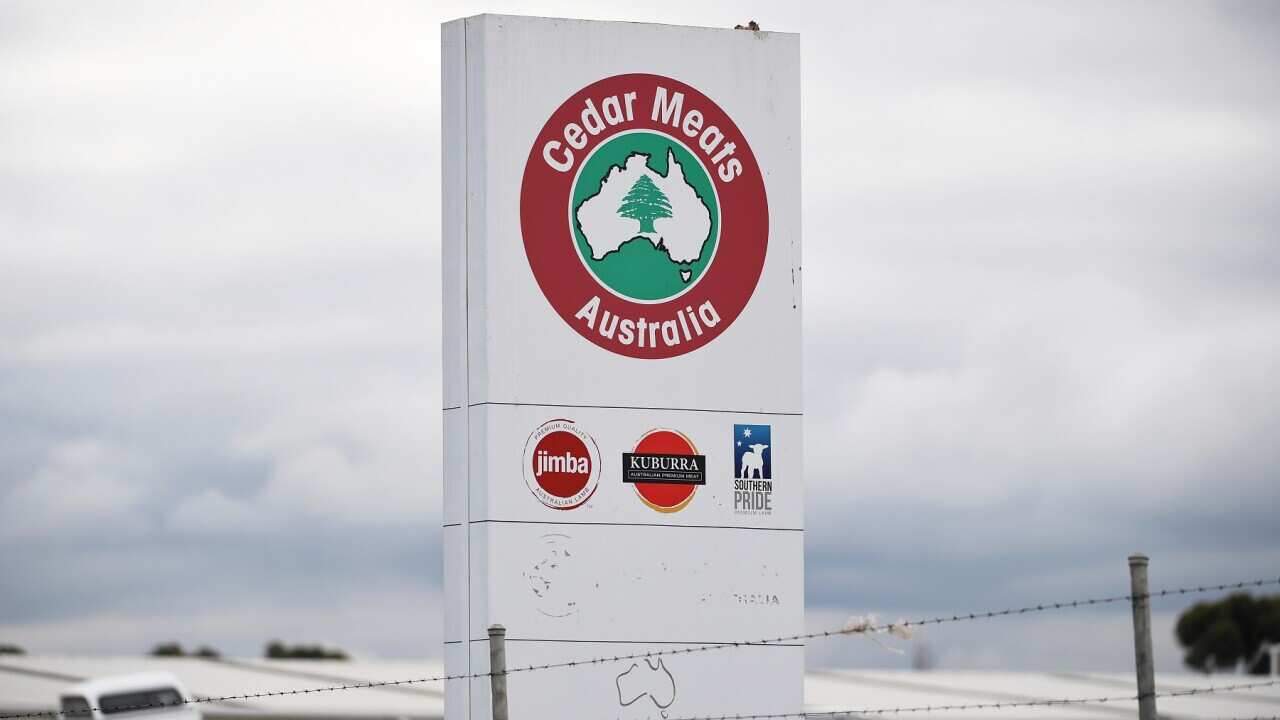 Signage for Cedar Meats Australia is seen in Melbourne, Monday, May 4, 2020. Victoria has recorded 19 new COVID-19 cases connected to a cluster at Cedar Meats, a meat processing facility. (AAP Image/James Ross) NO ARCHIVING