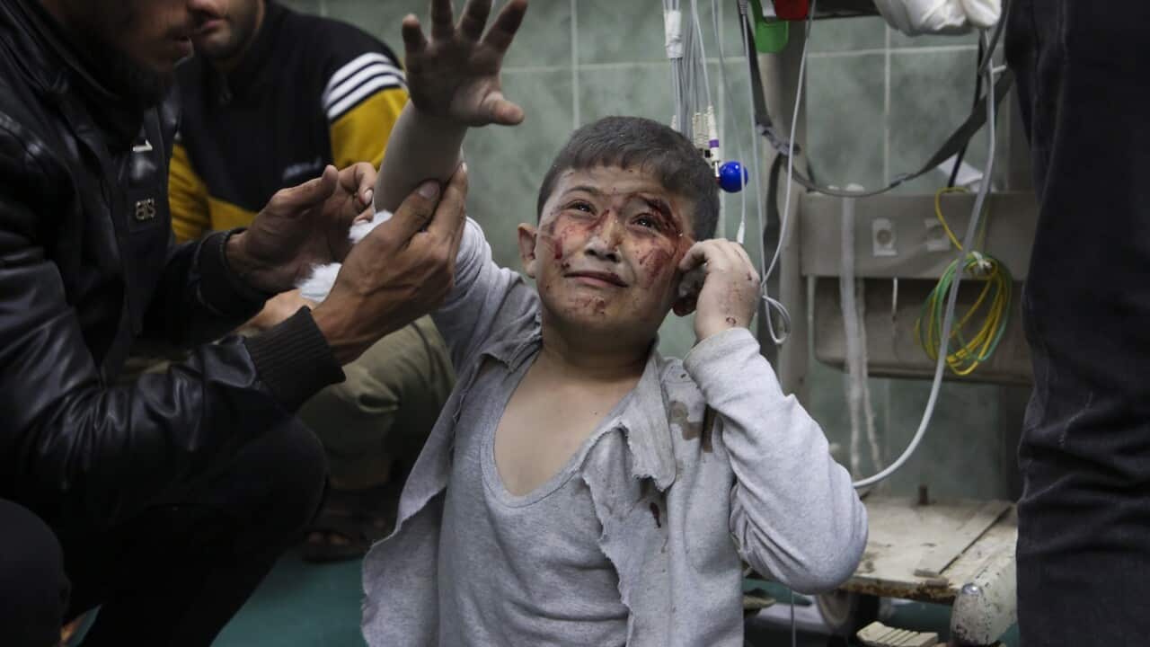 Palestinians wounded in the Israeli bombardment are brought to a hospital in Rafah, Gaza Strip (AAP)