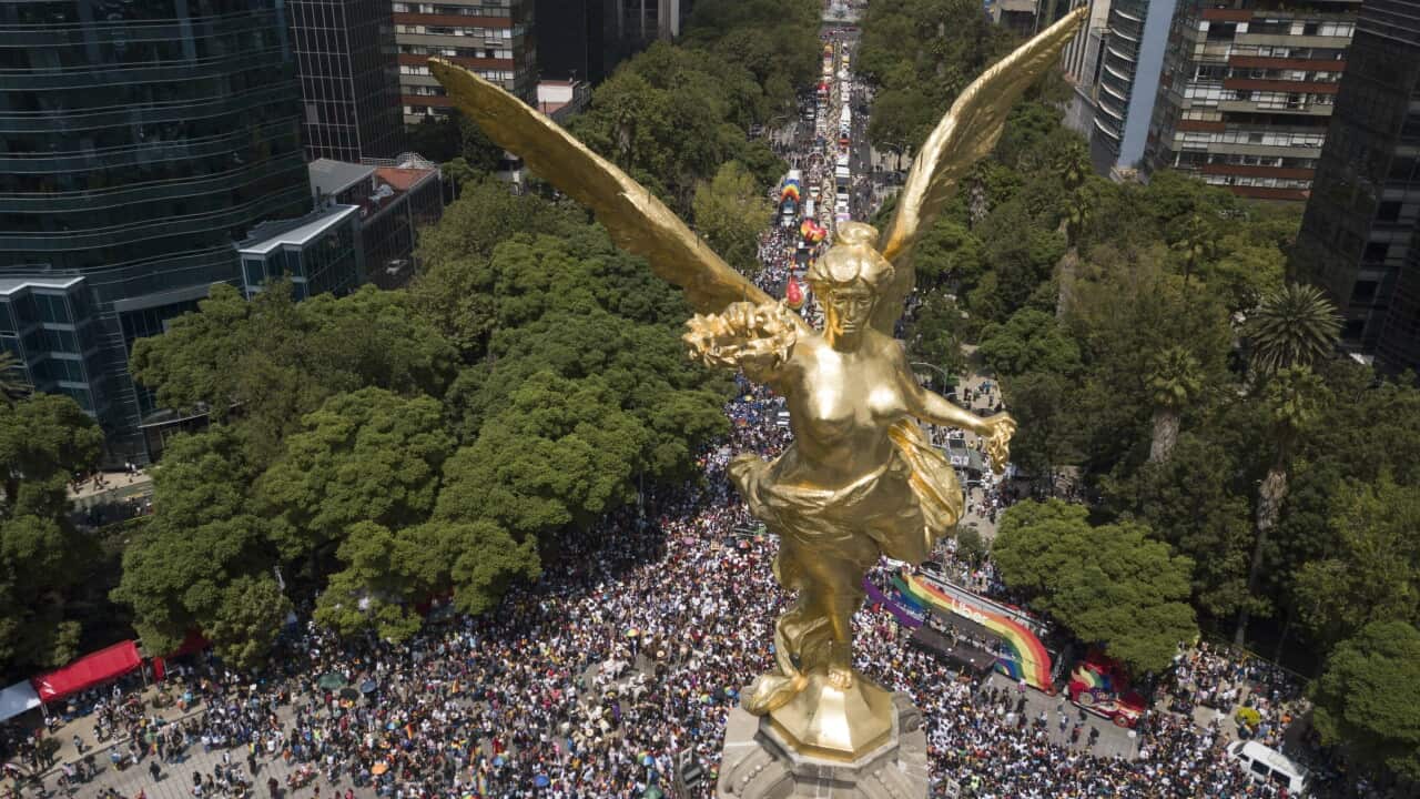 Mexico City's Angel of Independence dominates the starting point of the a gay pride parade in Mexico City, Saturday, Jun. 29, 2019. (AP Photo/Christian Palma)