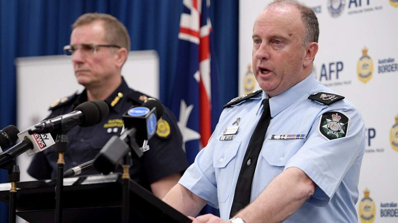 The AFP's Neil Gaughan says a man has been charged for acting as an agent for North Korea.