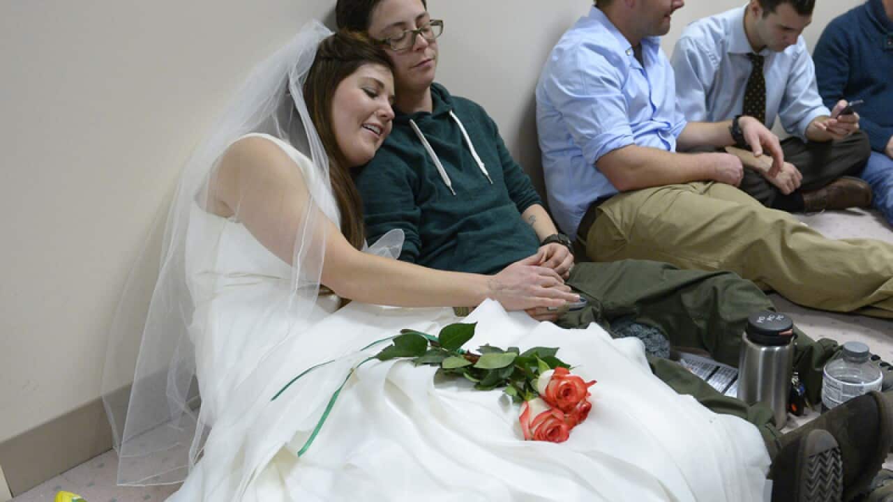 Same-sex couples in county clerk offices around the state of Utah