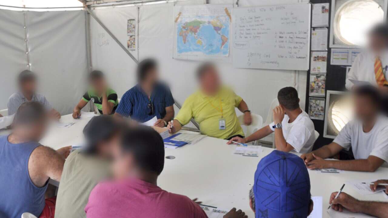 People in an education room at the Manus Island detention centre