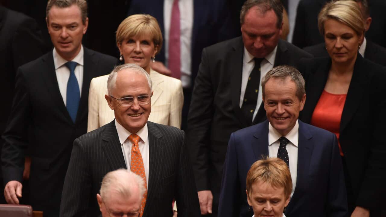Prime Minister Malcolm Turnbull (L) and Leader of the Opposition Bill Shorten arrive during the reopening of Parliament in the Senate chamber at Parliament House in Canberra on Monday, April 18, 2016. (AAP Image/Mick Tsikas) NO ARCHIVING