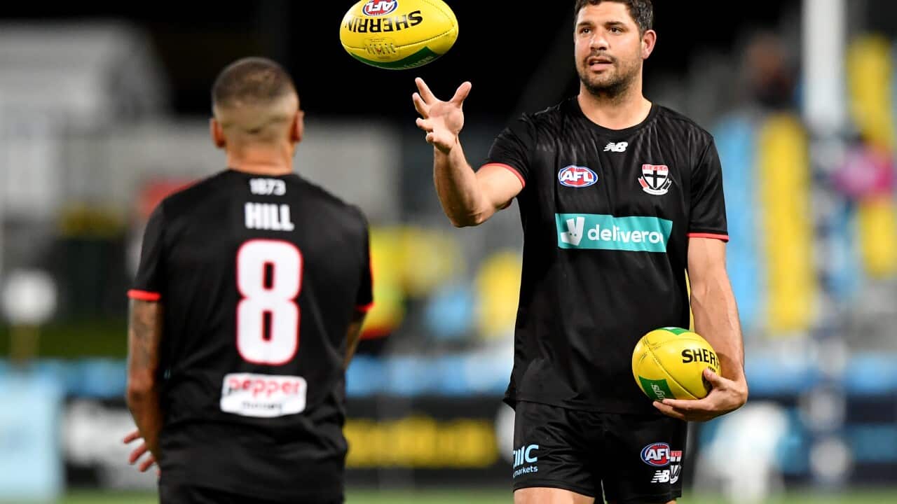 Ryder and Hill warm up together