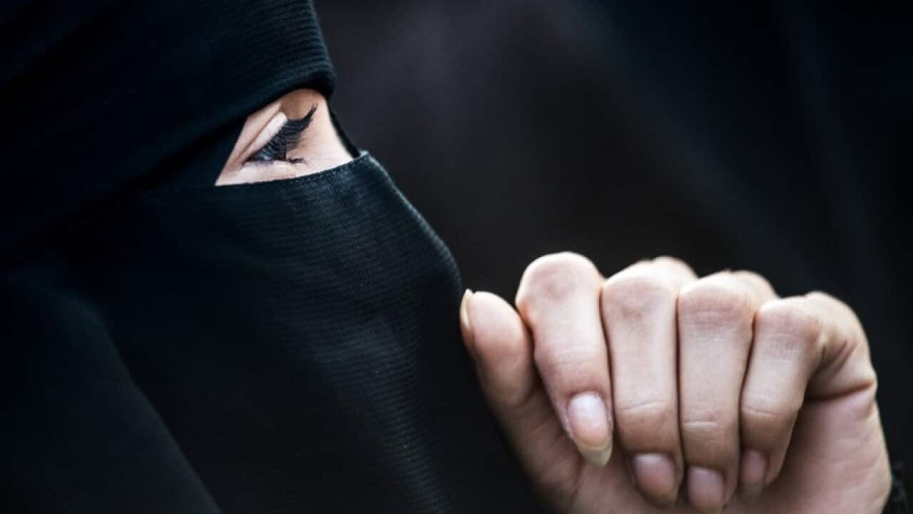 A woman wearing a niqab