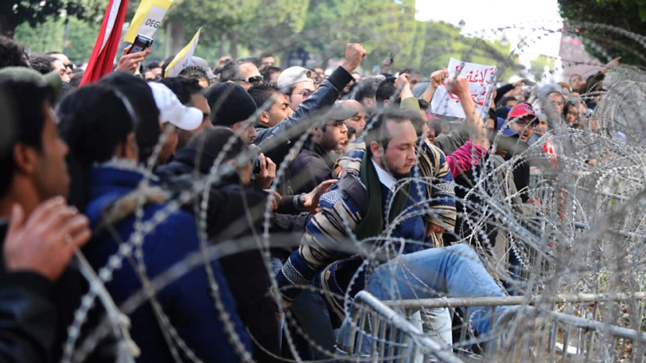Tunisia turmoil after opposition head shot