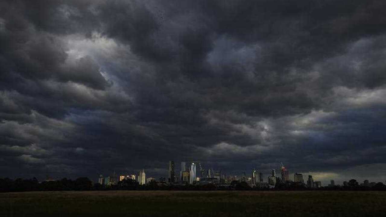 Storm clouds are seen over Melbourne's CBD.