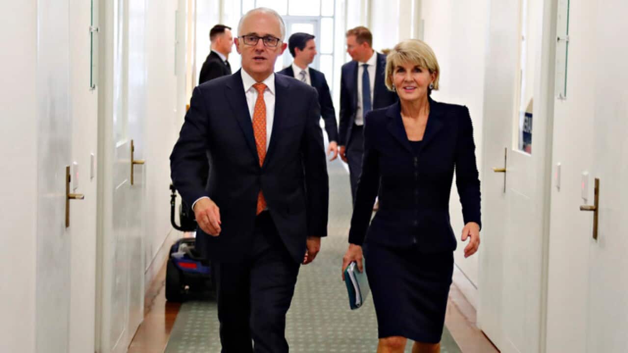 Malcolm Turnbull and Julie Bishop in the corridors of parliament