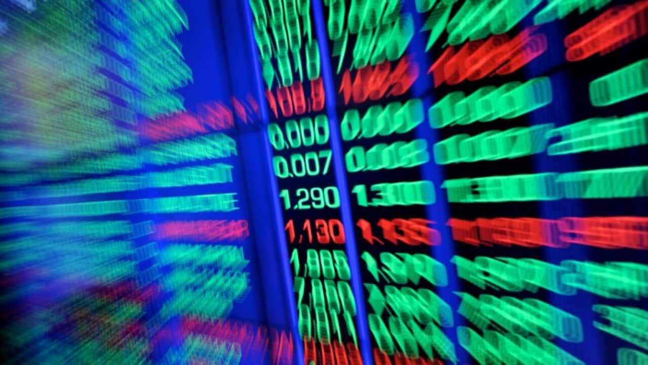 A screen displays stock market prices at the Australian Stock Exchange in Sydney, Wednesday, July 23, 2014. (AAP Image/Joel Carrett) NO ARCHIVING