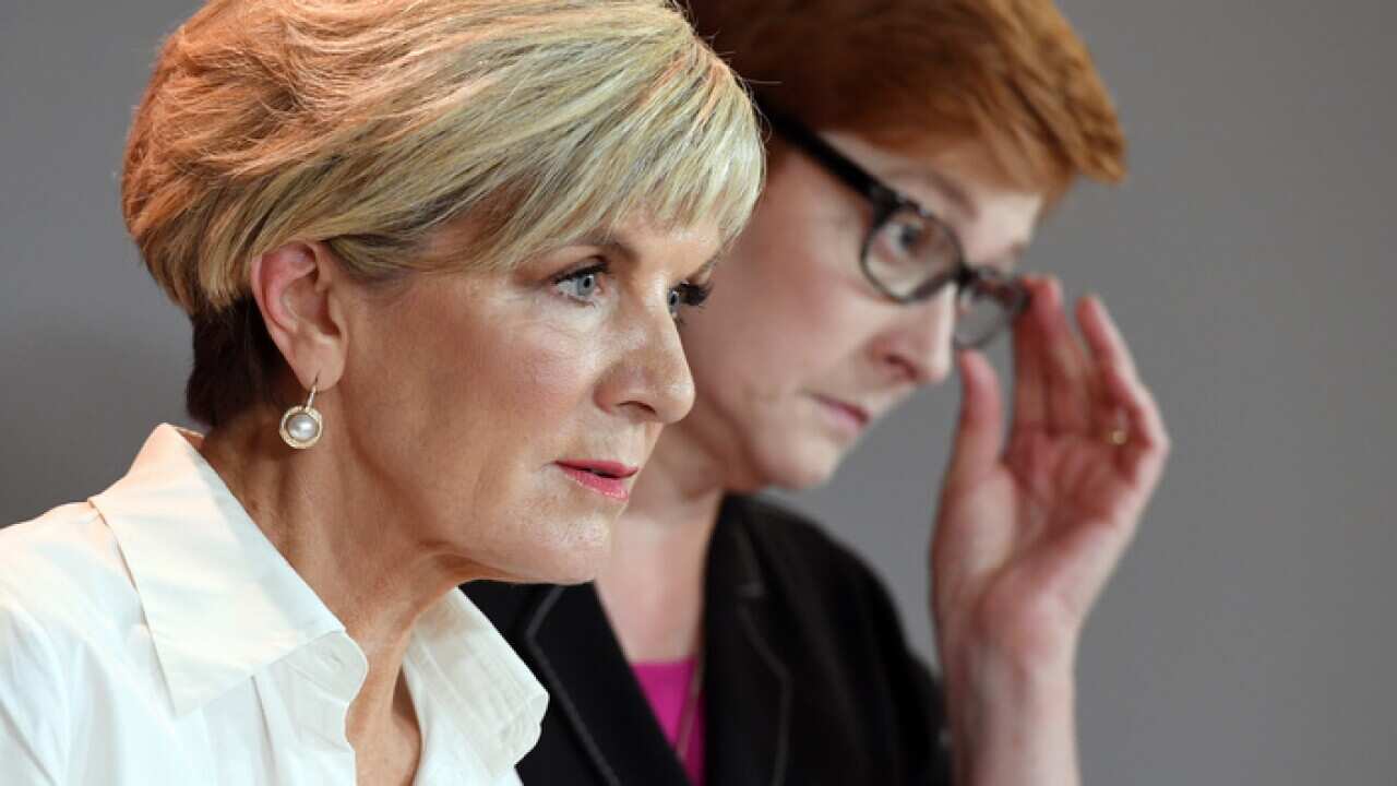 Australia's Foreign Minister Julie Bishop (L) and Defence Minister Marise Payne (R) March 16, 2018.