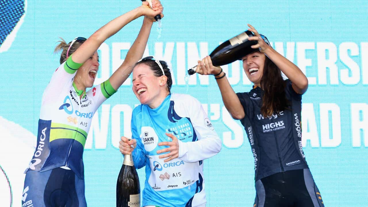 (L-R) Rachel Neylan celebrates on the podium with Amanda Spratt and Danielle King at the Cadel Evans Great Ocean Road Race