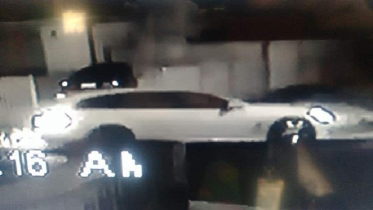 A late model white Holden Commodore station wagon, without number plates, was seen at both home invasions.