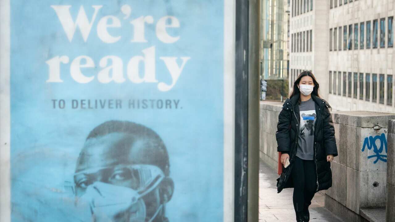 woman wearing a face mask.