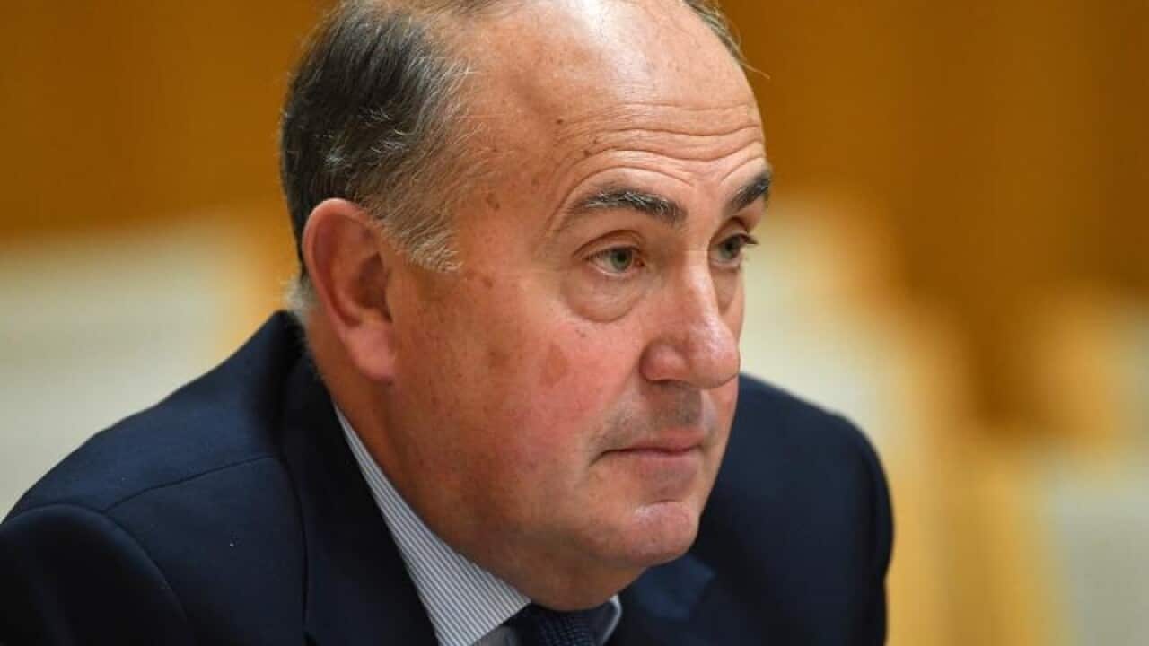 Secretary to the Treasury John Fraser during Senate hearing.