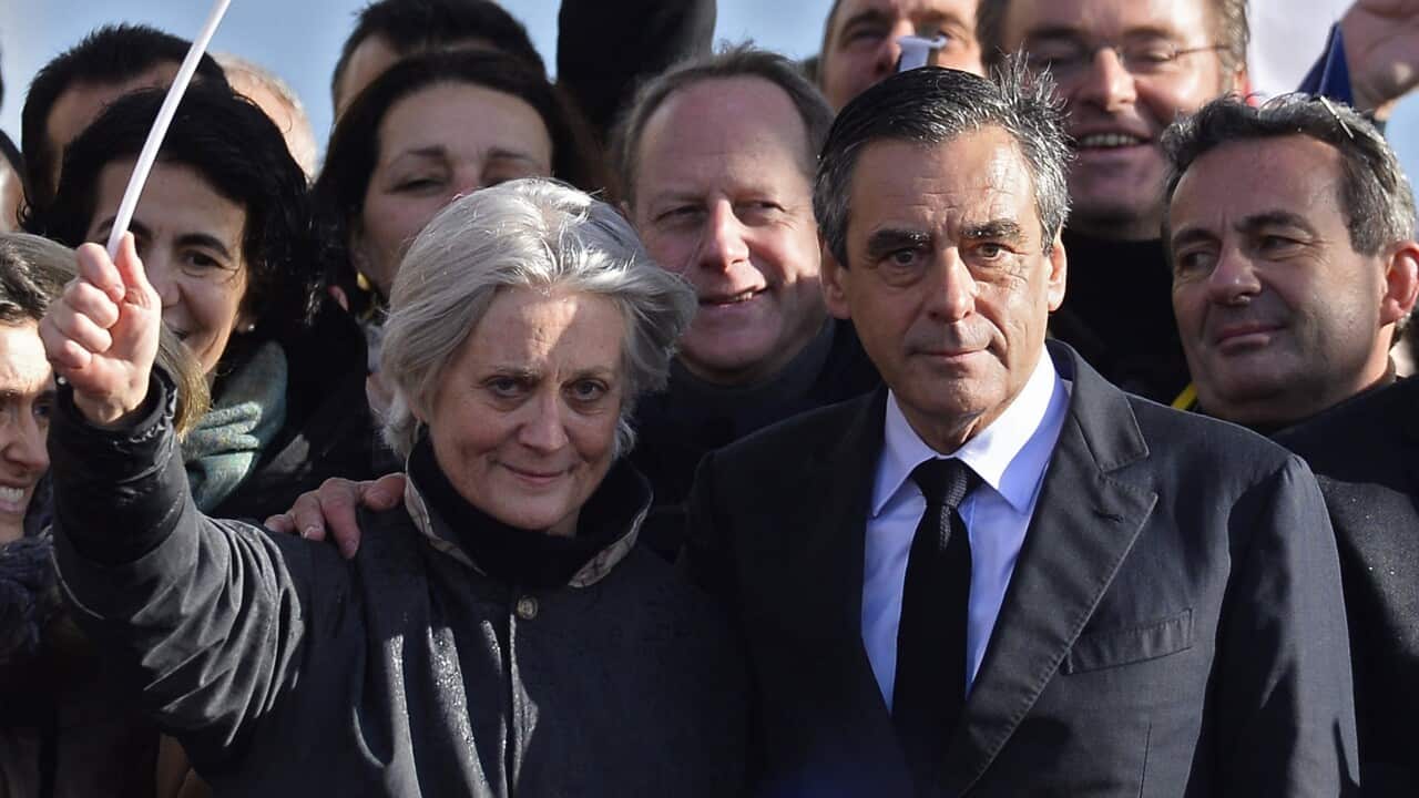 A March 2017 file photo: 'Les Republicains' party candidate for the 2017 French presidential elections, Francois Fillon (L) flanked by his wife Penelo