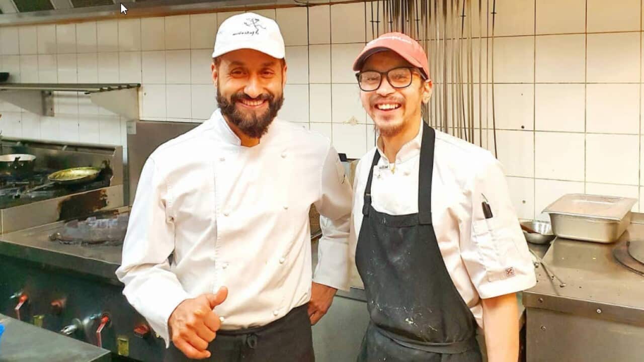 Bhim Neupane (left) at Nirankar restaurant in Melbourne