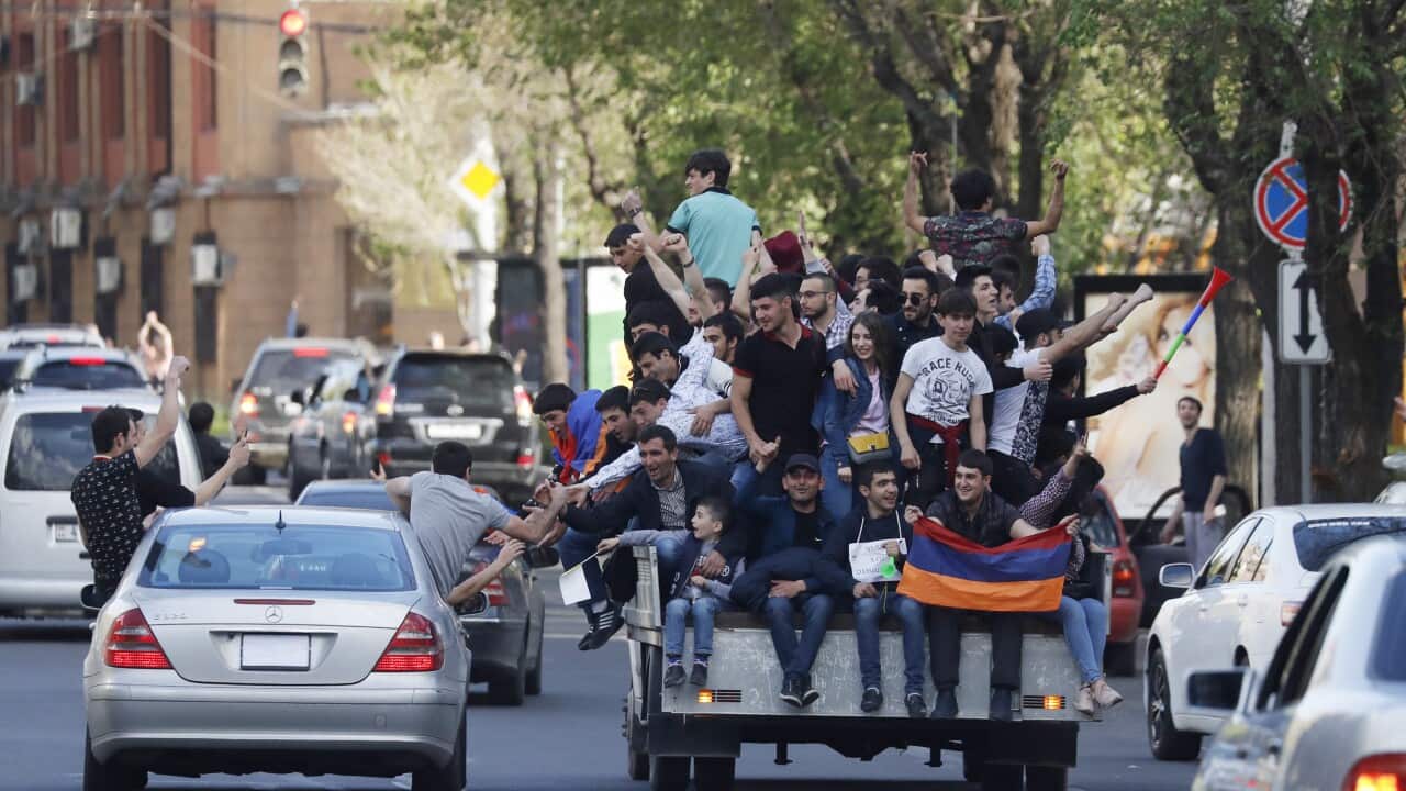 People celebrate in central Yerevan after Prime Minister Sargsyan announced his resignation.