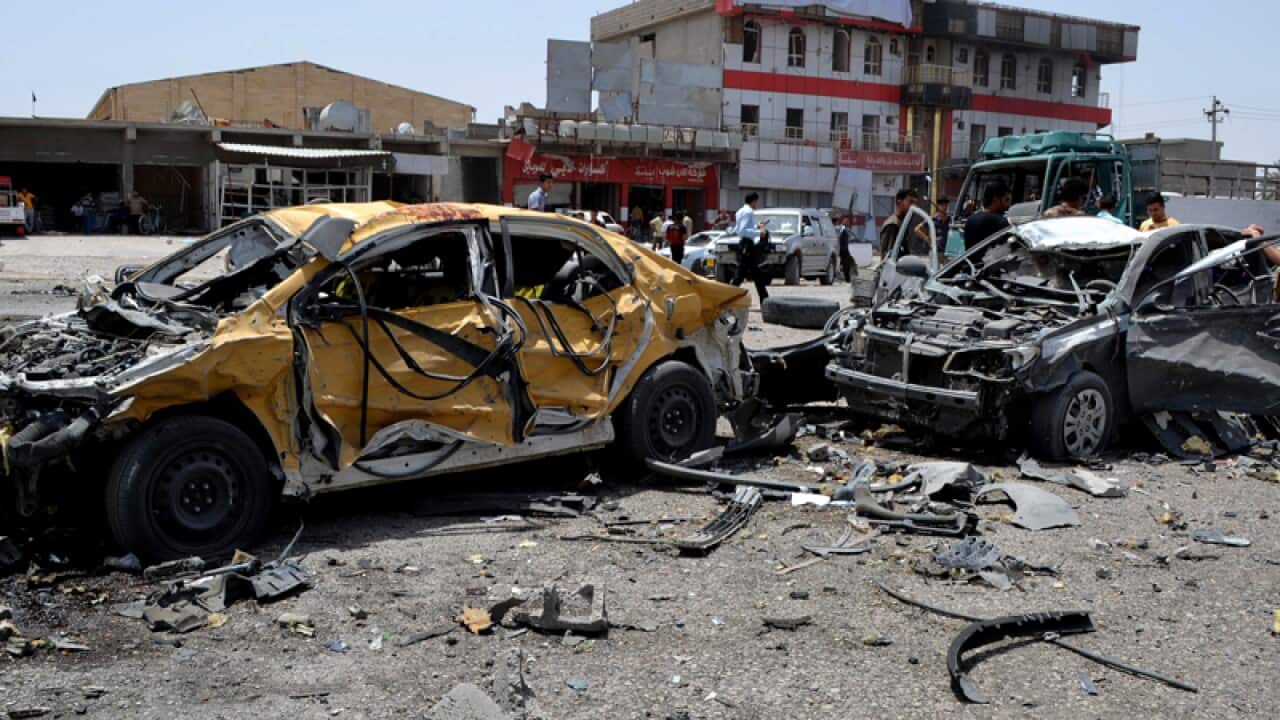 The site of a suicide bomb attack north of Baghdad