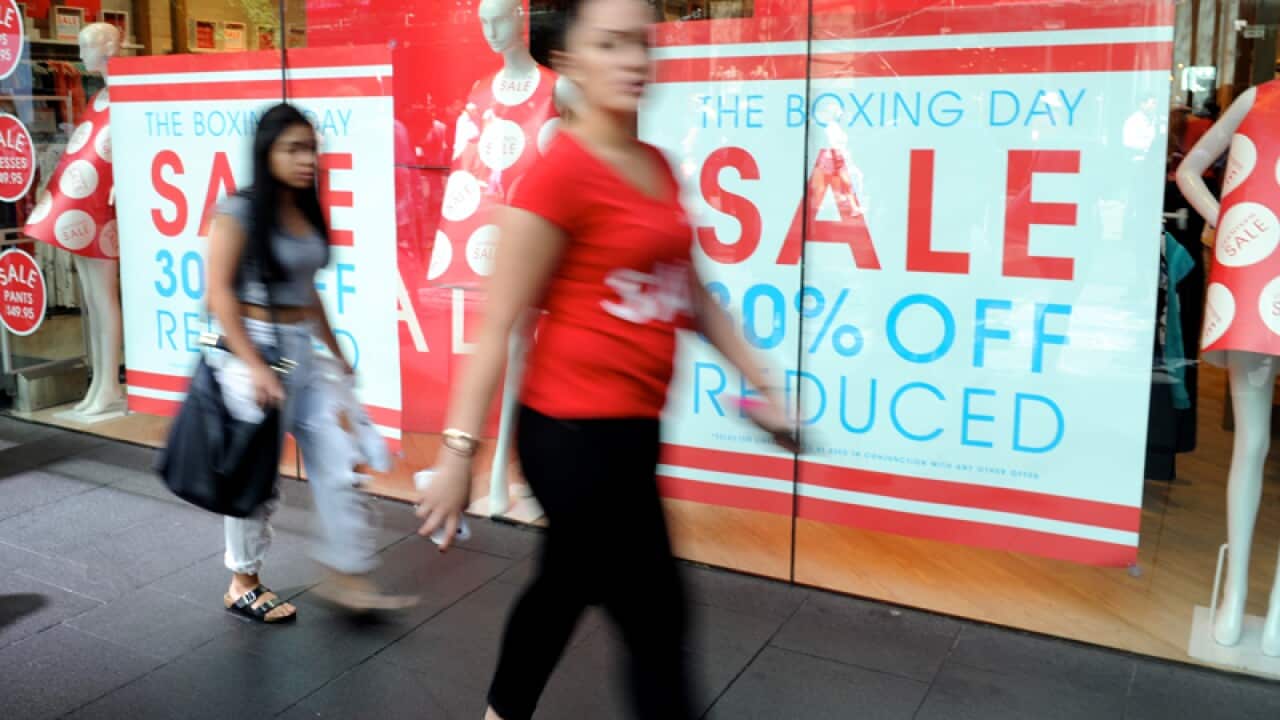 Sales signage at a women's fashion store