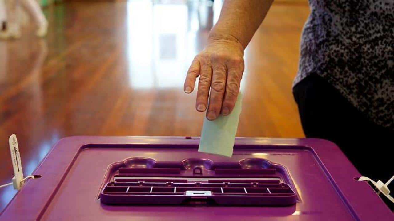 Voters posting their votes at Byford North polling station on election day during the Canning by election, Western Australia, Byford, Western Australia, Saturday Sept. 19, 2015. (AAP Image/Richard Wainwright) NO ARCHIVING