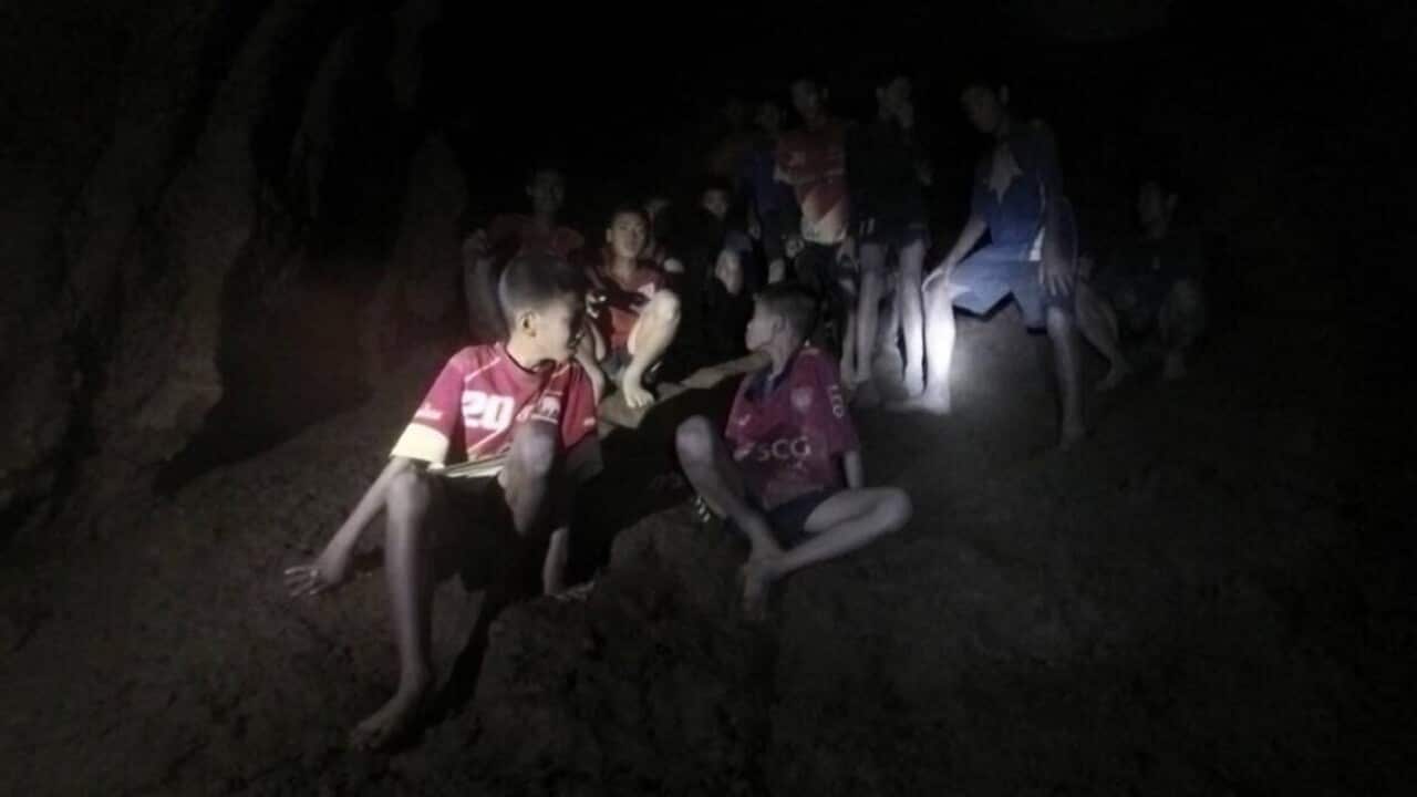 An undated handout photo released by Royal Thai Army on 03 July 2018 shows the missing 13 young members of a youth soccer team including their coach