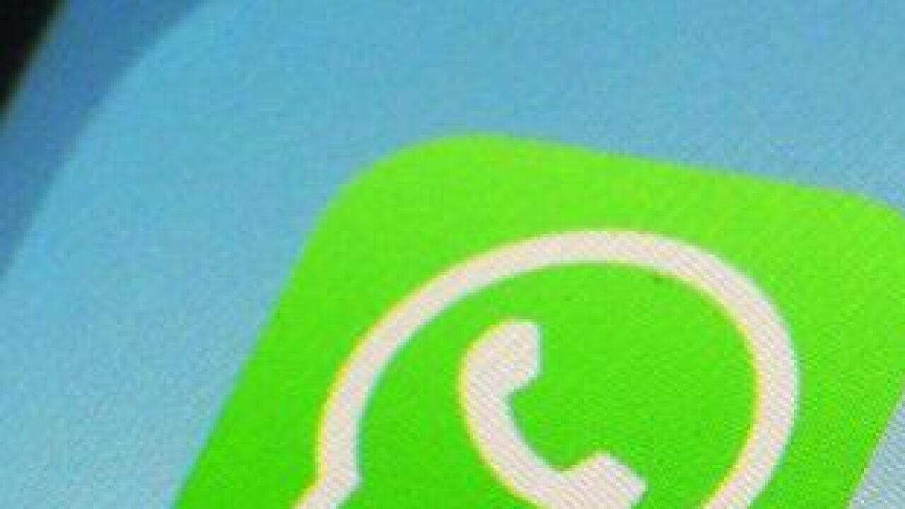 WhatsApp and Facebook app icons on a smartphone in New York