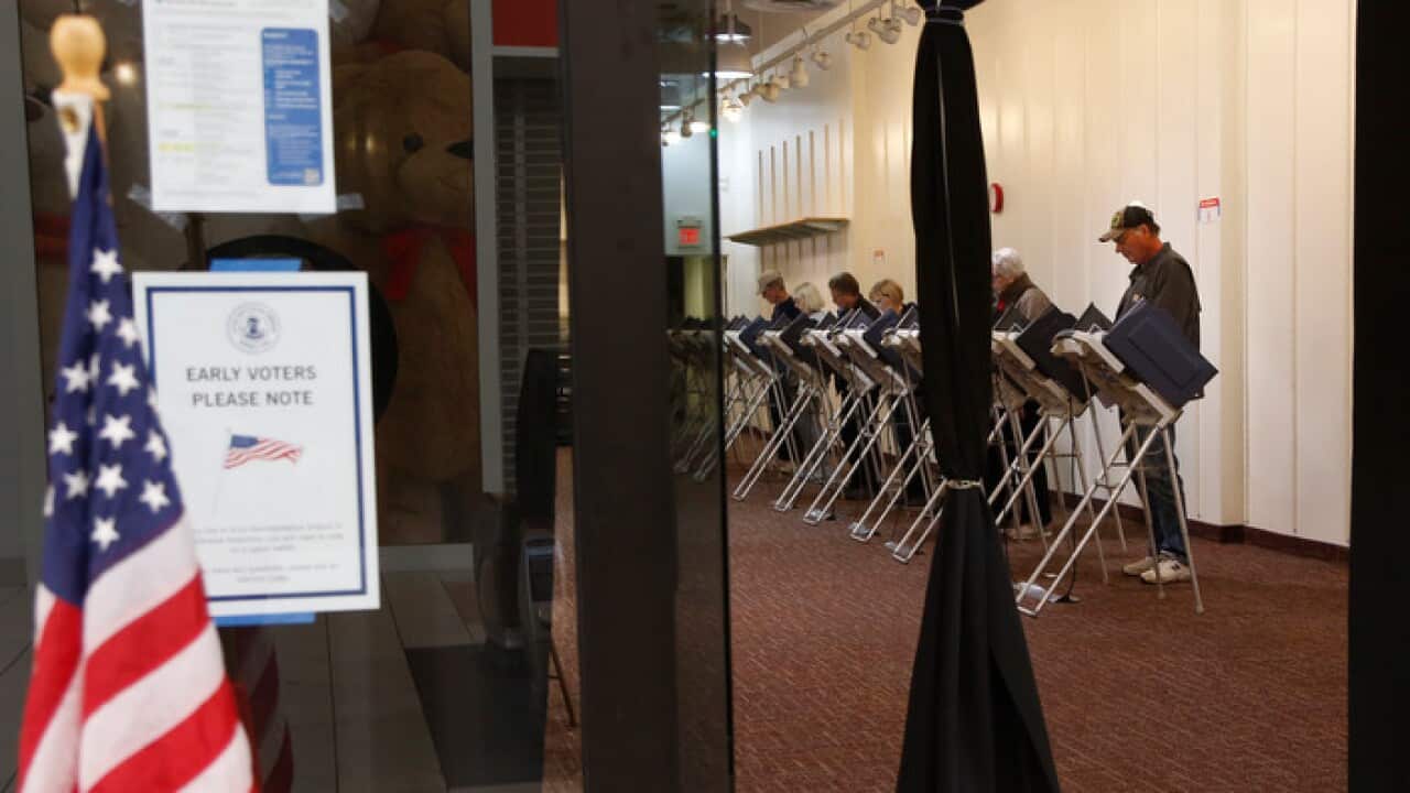 Voters fill in election ballots