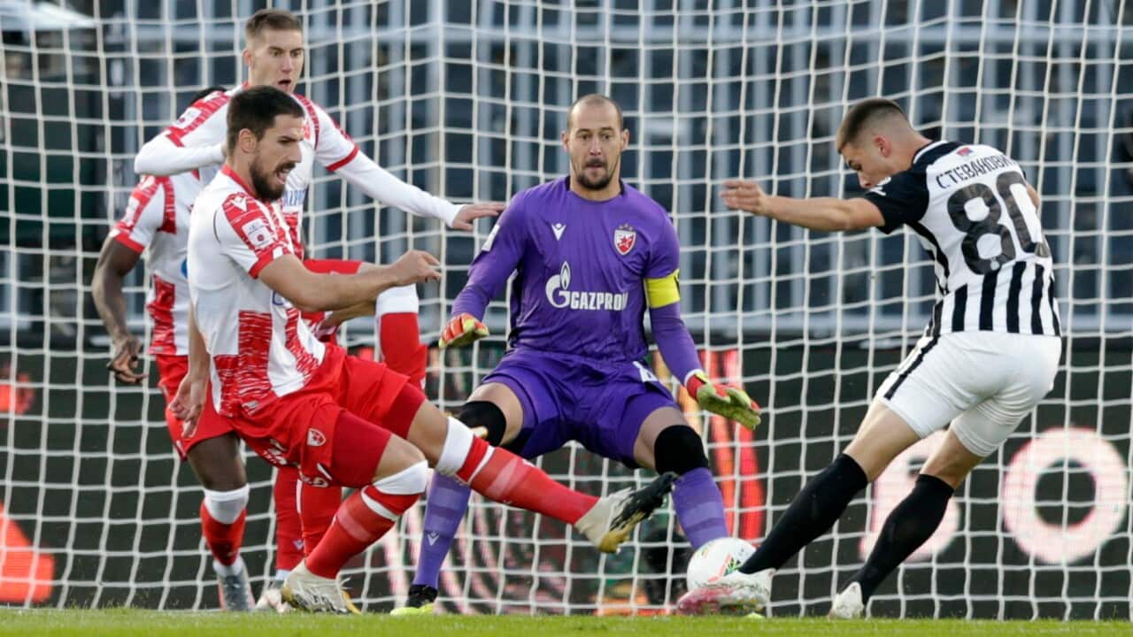Partizan's Filip Stevanovic (R) scores during the Serbian SuperLiga soccer match between Partizan and Red Star in Belgrade, Serbia, 18 October 2020. The match ended in a stalemate 1-1