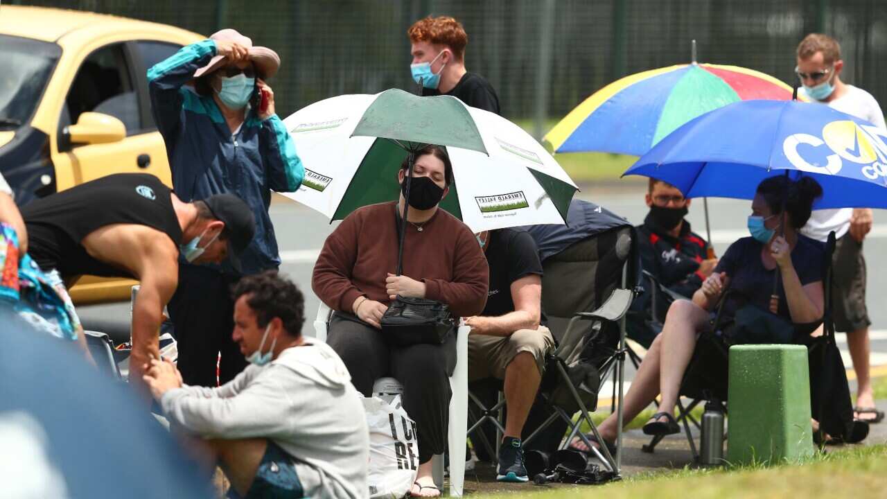 People wait in line for a covid test at Robina Health Precinct on January 5, 2022 in Gold Coast, Australia.