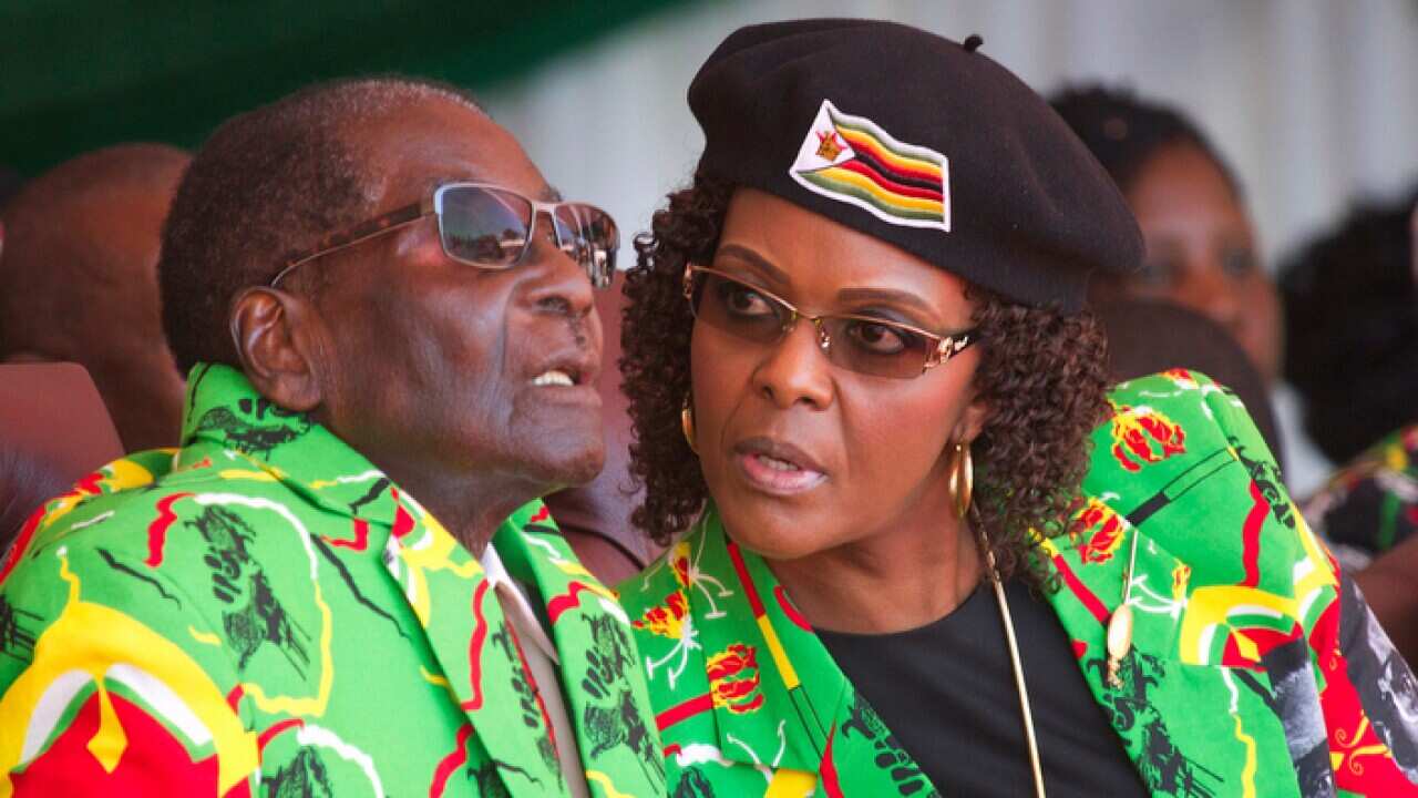 photo of Zimbabwean President Robert Mugabe and his wife Grace at a youth rally