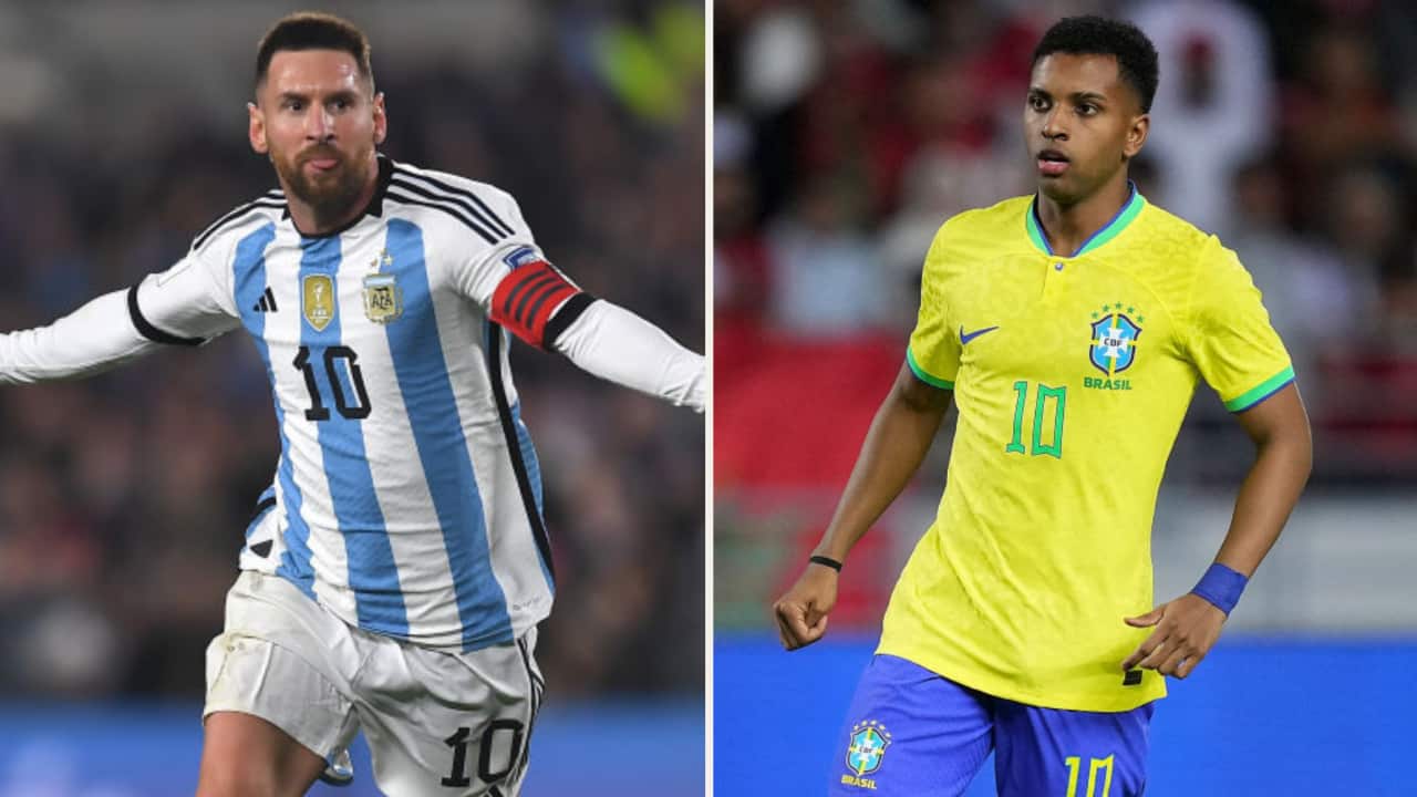 Lionel Messi of Argentina celebrates while Brazil's Rodrygo looks on