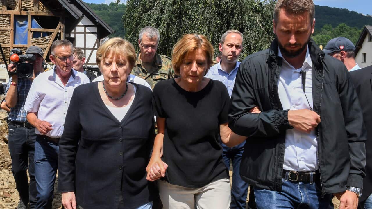 German Chancellor Angela Merkel and Rhineland-Palatinate State Premier Malu Dreyer visit the flood-ravaged village of Schuld in western Germany.