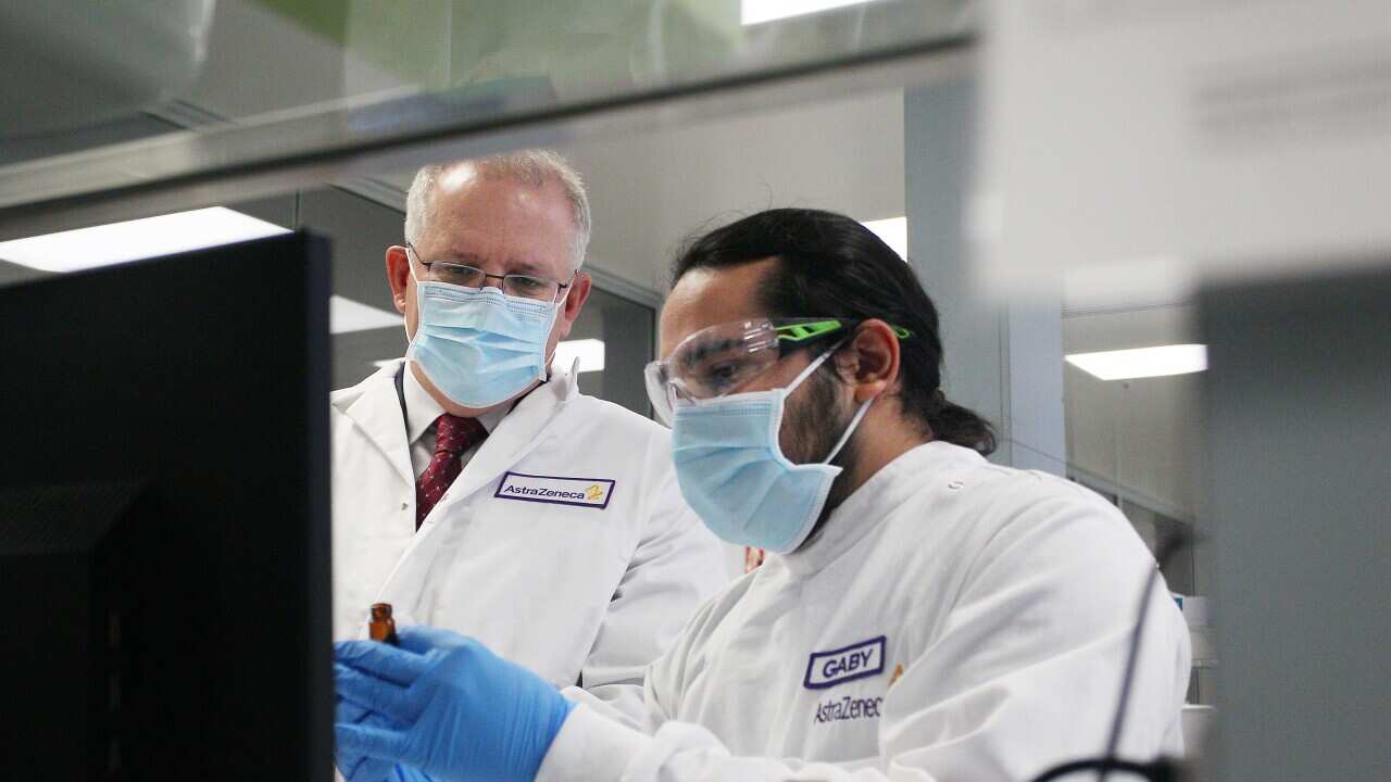 Australian Prime Minister Scott Morrison meets with team member Gaby Atencio in the Analytical Laboratory during a visit to AstraZeneca laboratories in Sydney.