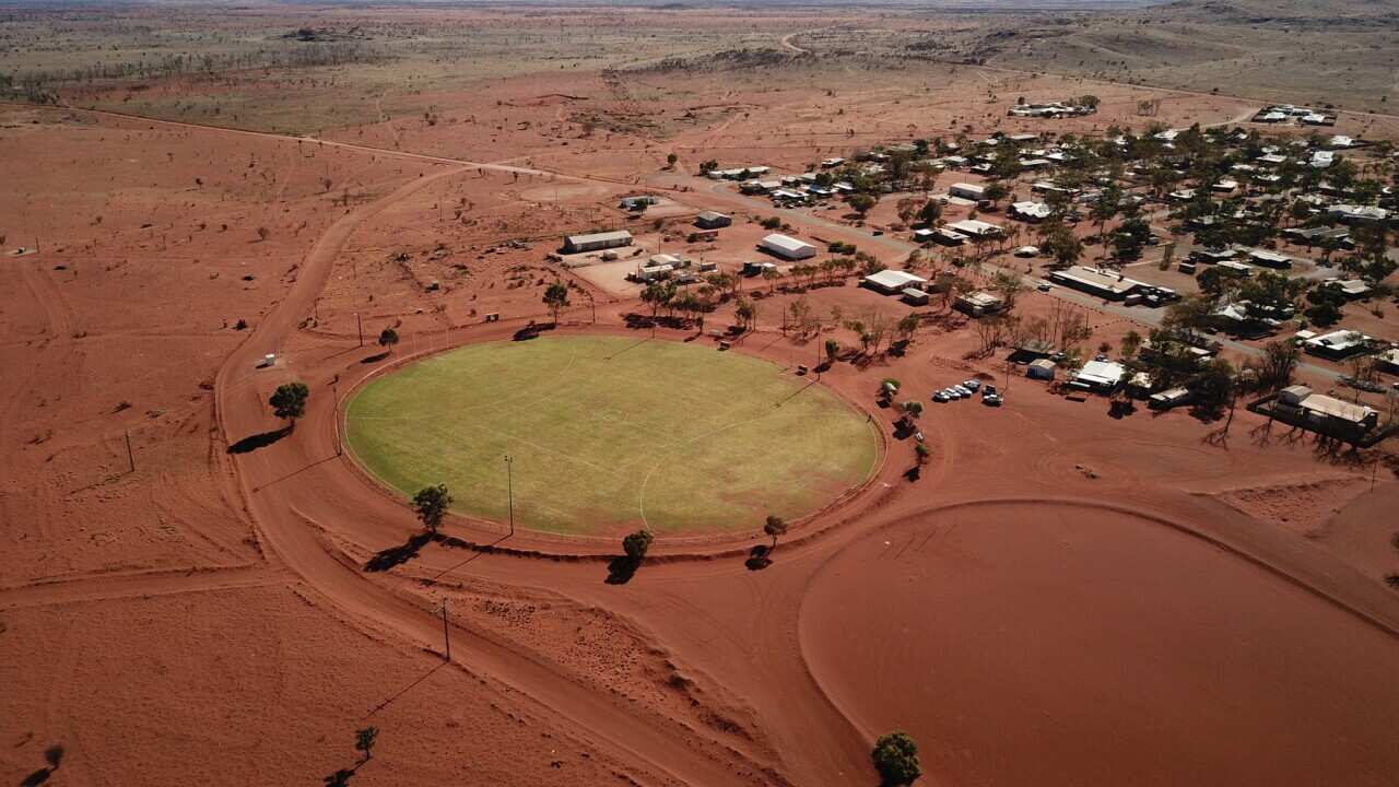 The new grass community oval at Amata is uniting the desert town. (SBS)