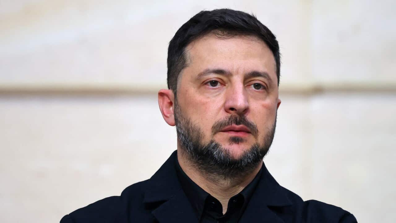 Ukrainian President Volodymyr Zelensky attends a joint press conference with the French president at the Elysee Palace in Paris