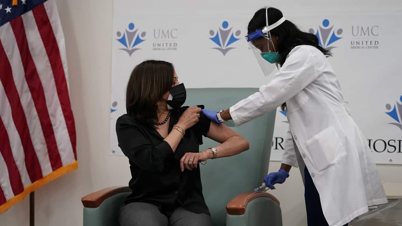US Vice President-elect Kamala Harris receives the Moderna COVID-19 vaccine
