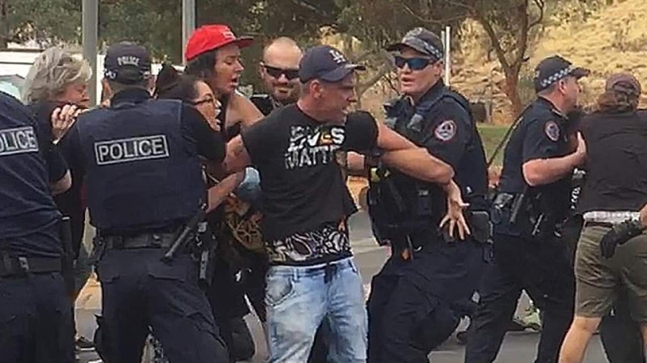 Dylan Voller being arrested by police.