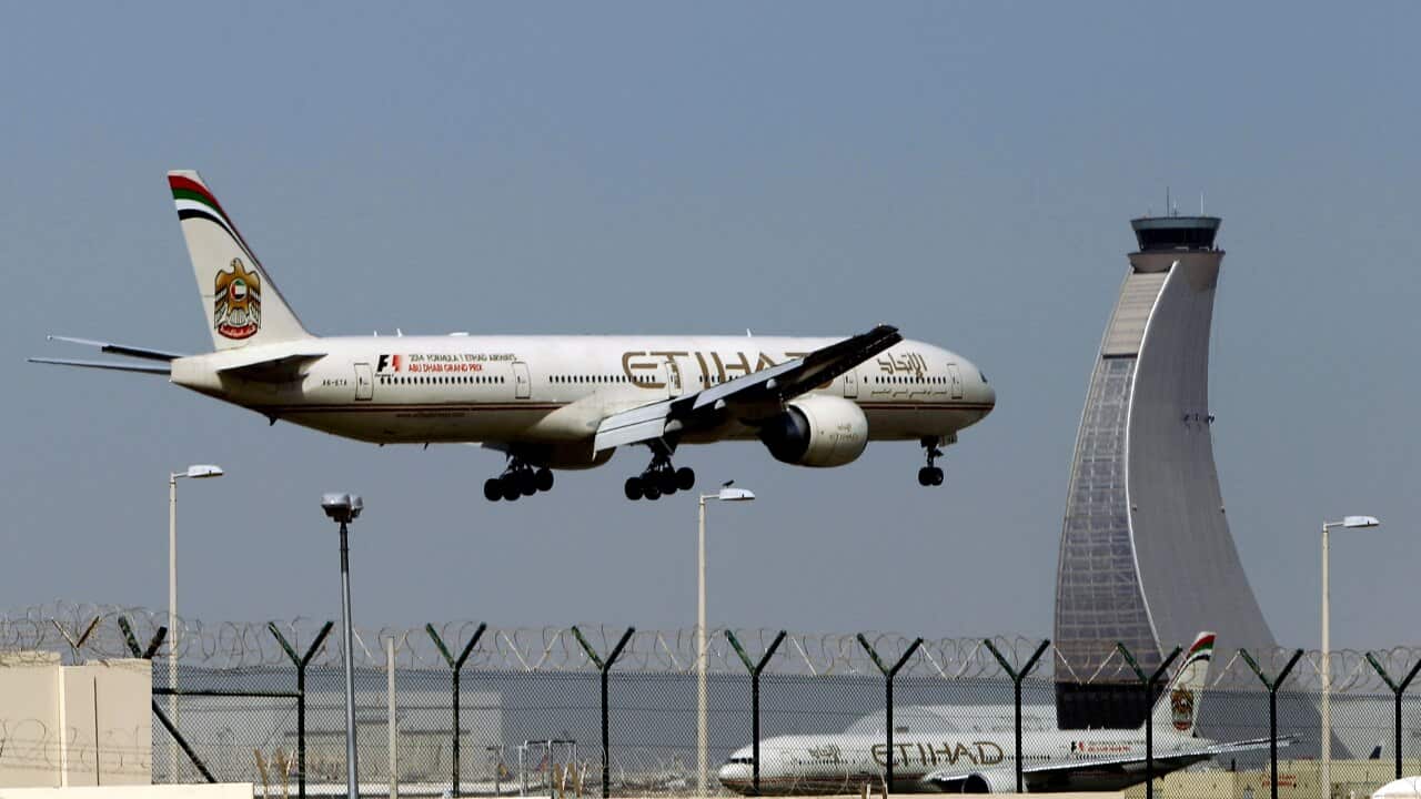 An Etihad Airways plane prepares to land at the Abu Dhabi airport in the United Arab Emirates.